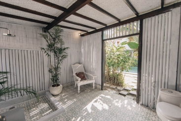 The Atelier - Tropical bathroom with seperate entrance